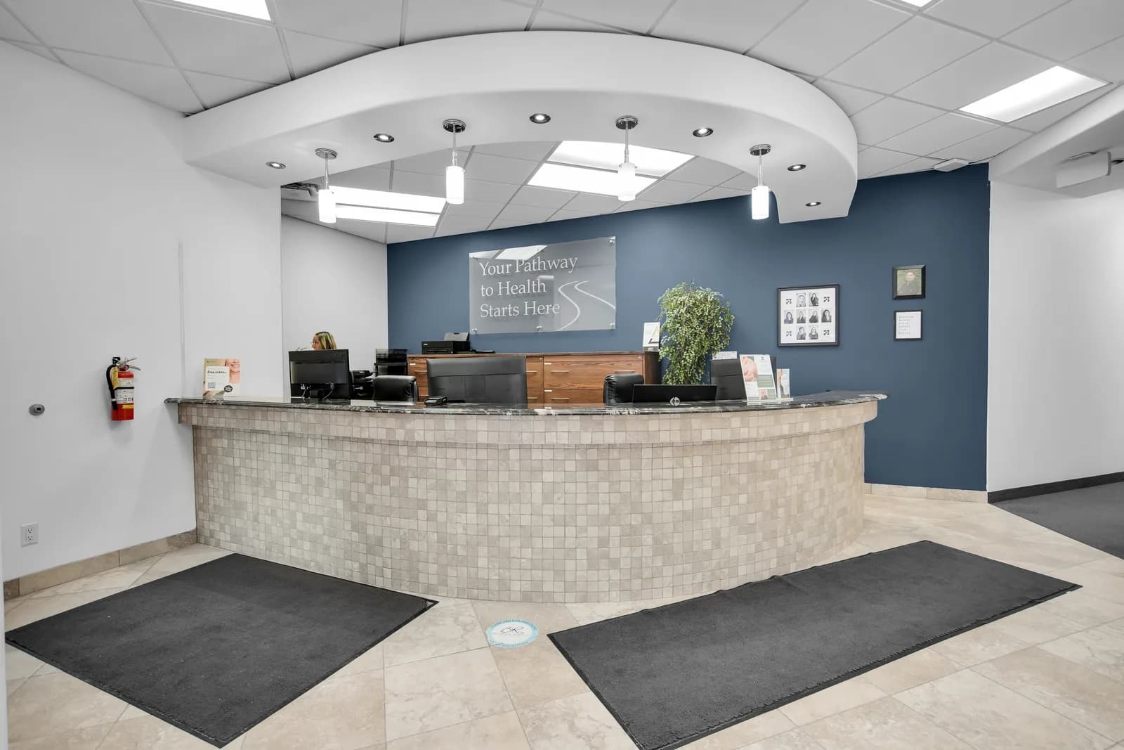 Front reception and waiting area at Root Cause Dental Group