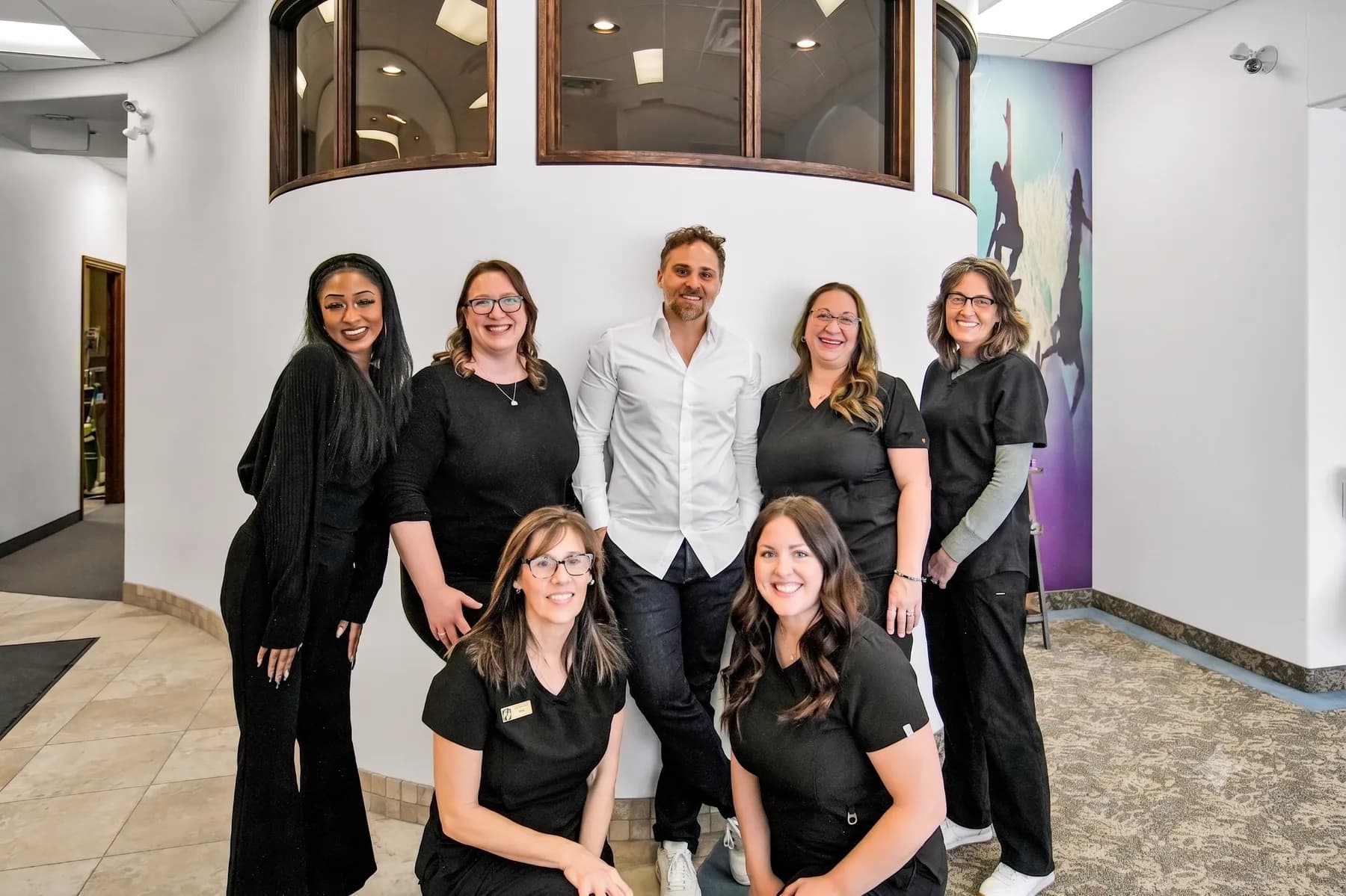 The Root Cause Dental Group team together at their London, Ontario dental clinic